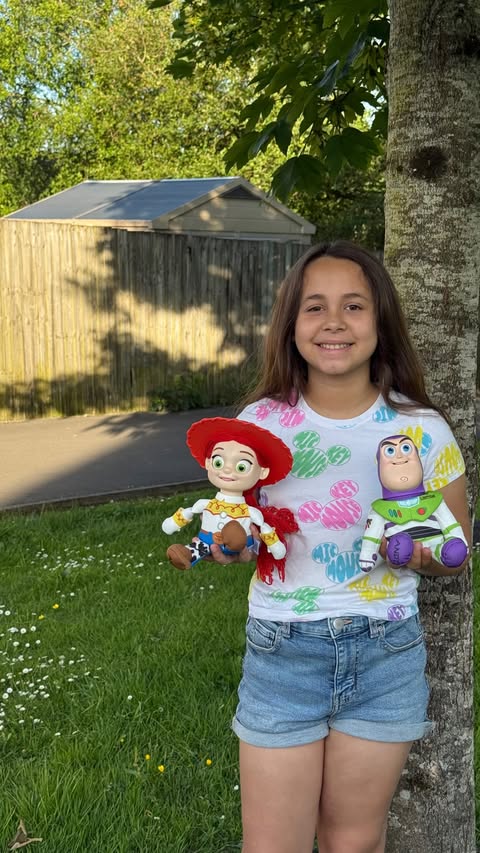Instagram post by @magicwithkerry for The Entertainer Toys. Caption reads: AD - Toy Story has landed in the palm of our....