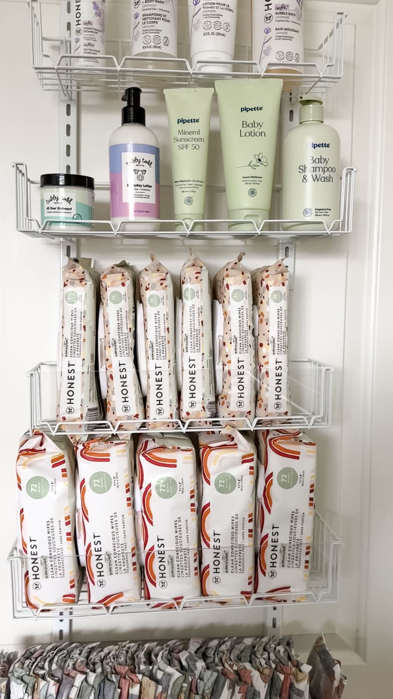 Instagram post by @allthingsjudyy for DELAMU. Caption reads: Organize & restock my baby’s diaper station 🤍....