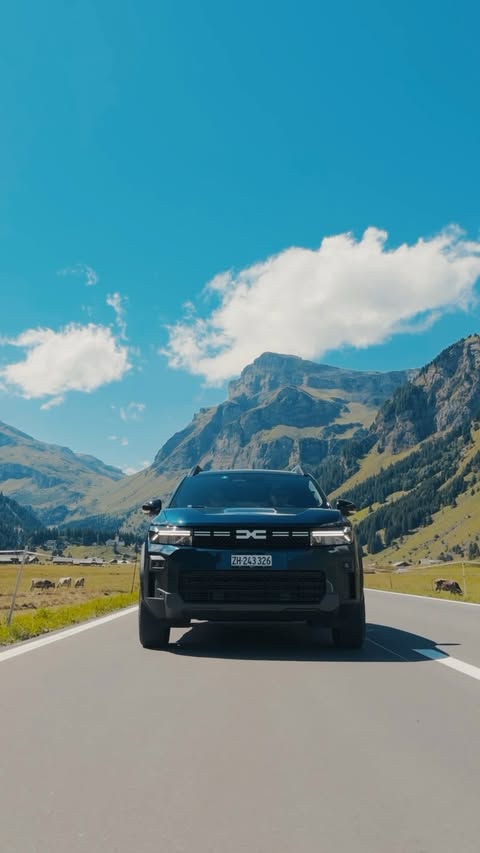 Instagram post by @switzerland_with_chrissy for Dacia. Caption reads: [...] fährt selten geradeaus. Gut, dass im....