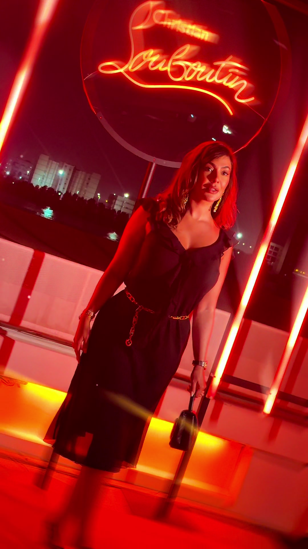 TikTok post by @zenalouay for Christian Louboutin. Caption reads: [...] of grace… brought to you by @Christian....