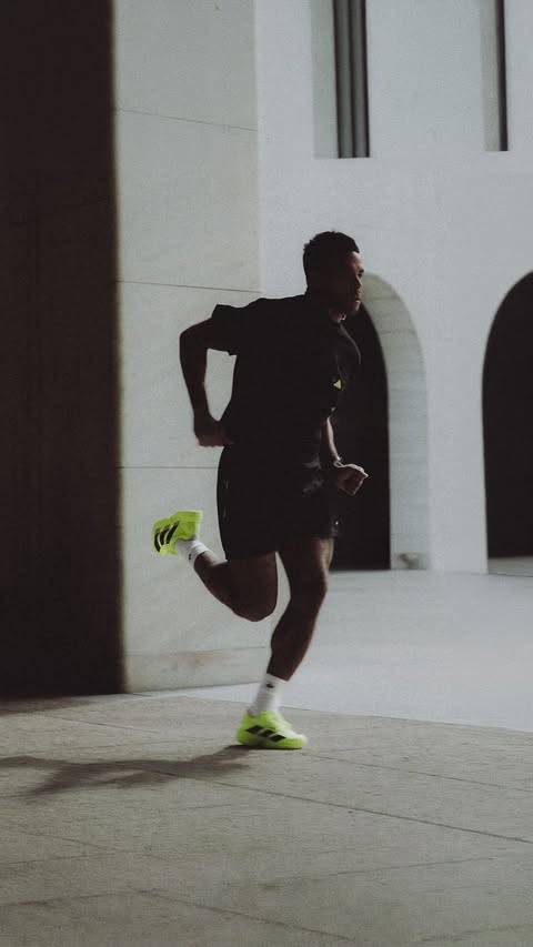 Instagram post by @michaelwashh for adidas Running. Caption reads: Big news. I am partnering with @adidasrunning as I....