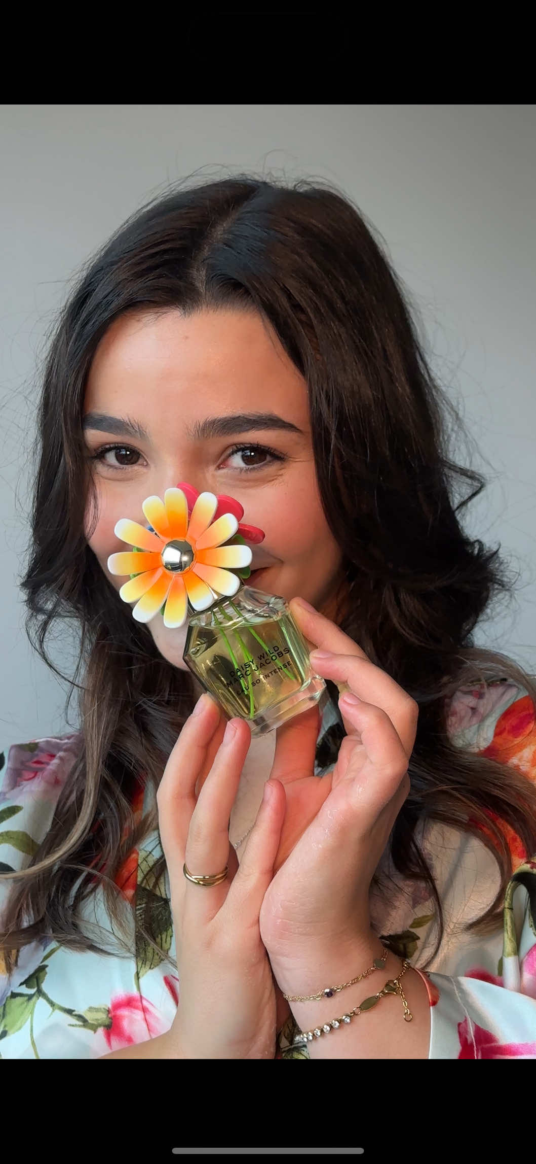 TikTok post by @contentwithcarina for Marc Jacobs Fragrances. Caption reads: #ad Ready for my summer adventure thanks to....