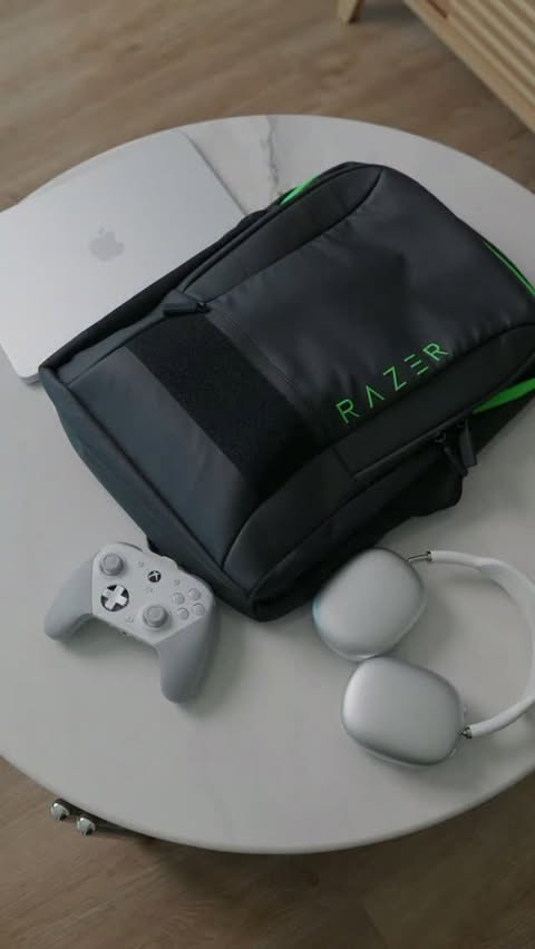 Instagram post by @mikebanh_ for Razer. Caption reads: [...] quick trip 🎒 Everything fits inside the....