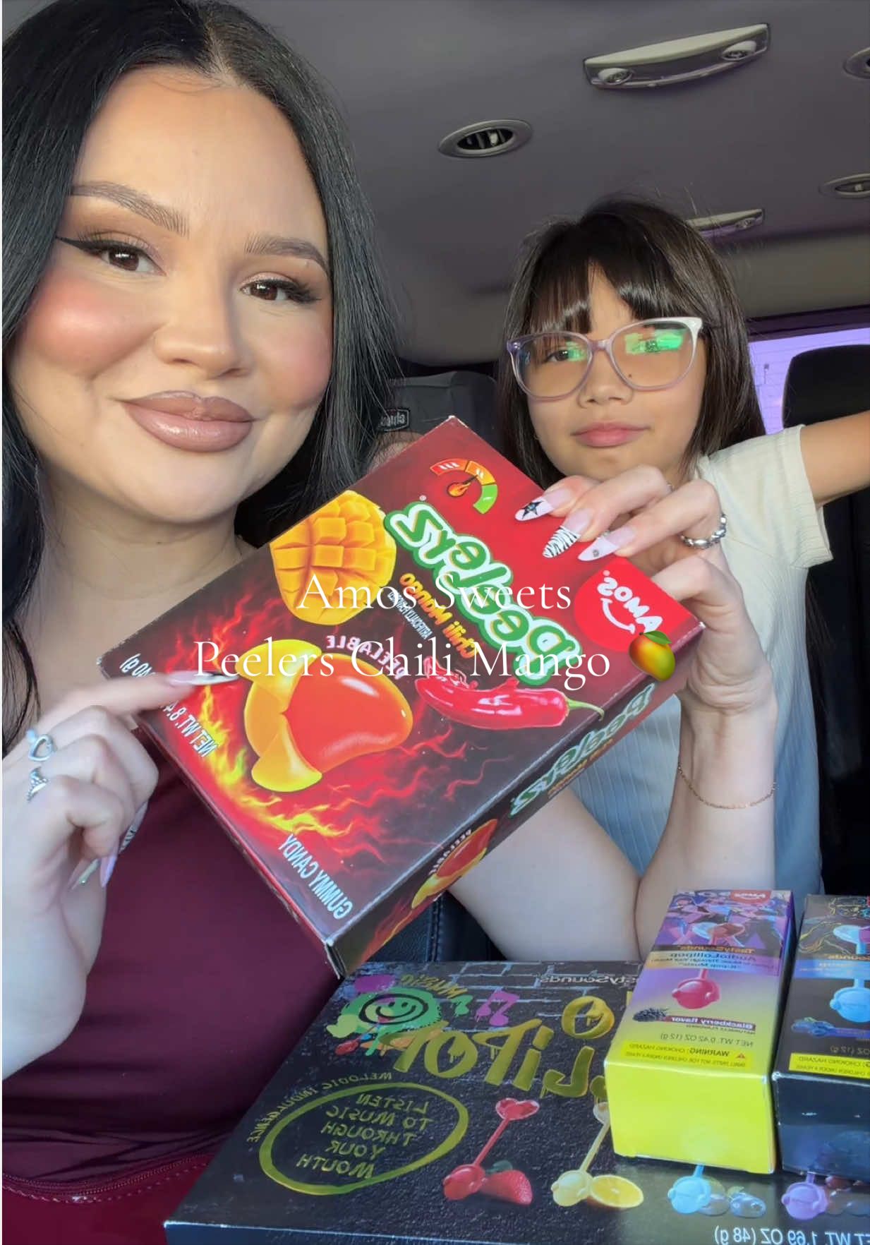 TikTok post by @keekittykimm for Amos Sweets. Caption reads: Snack Review w/ Kaylee 💙 @Amos Sweets Peeler’s....