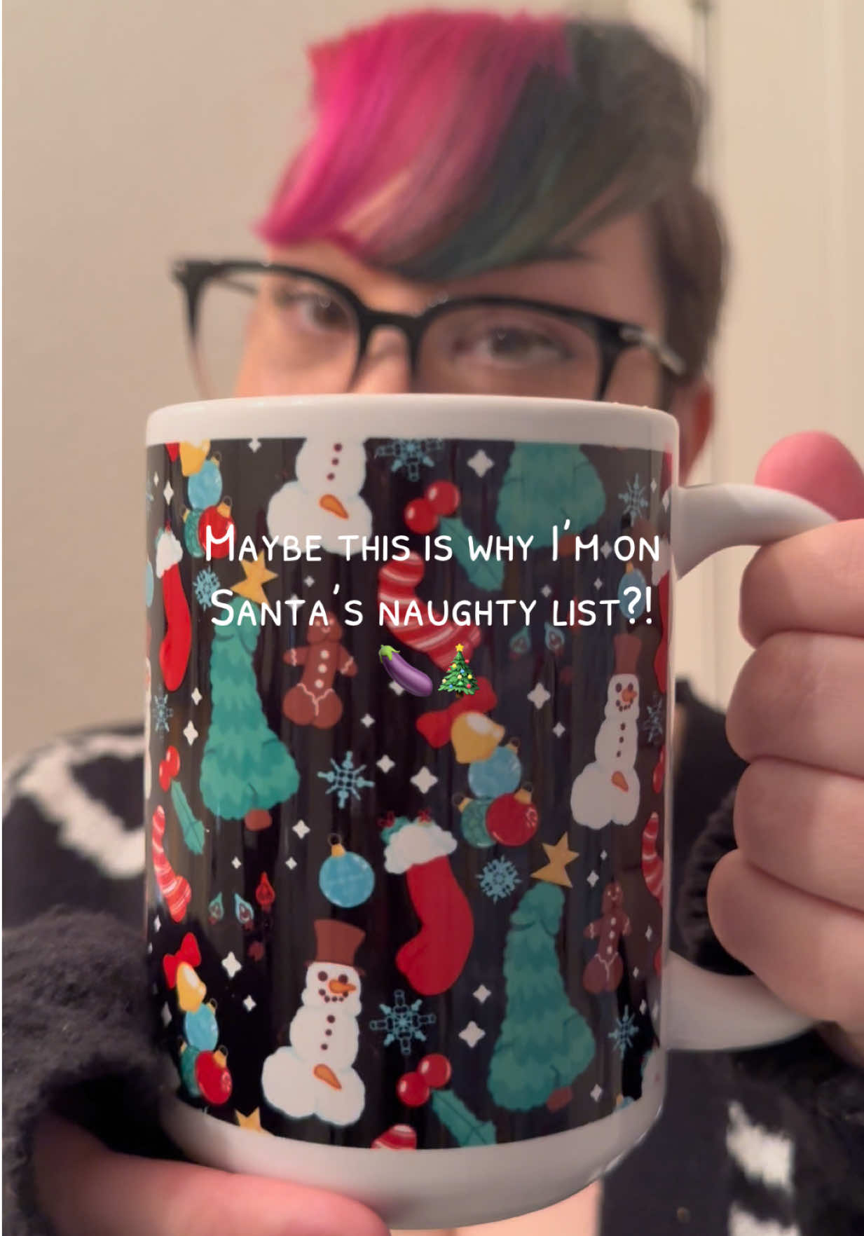TikTok post by @tiffany_masoner for LookHUMAN. Caption reads: This @LookHUMAN Christmas mug with dirty humor is....