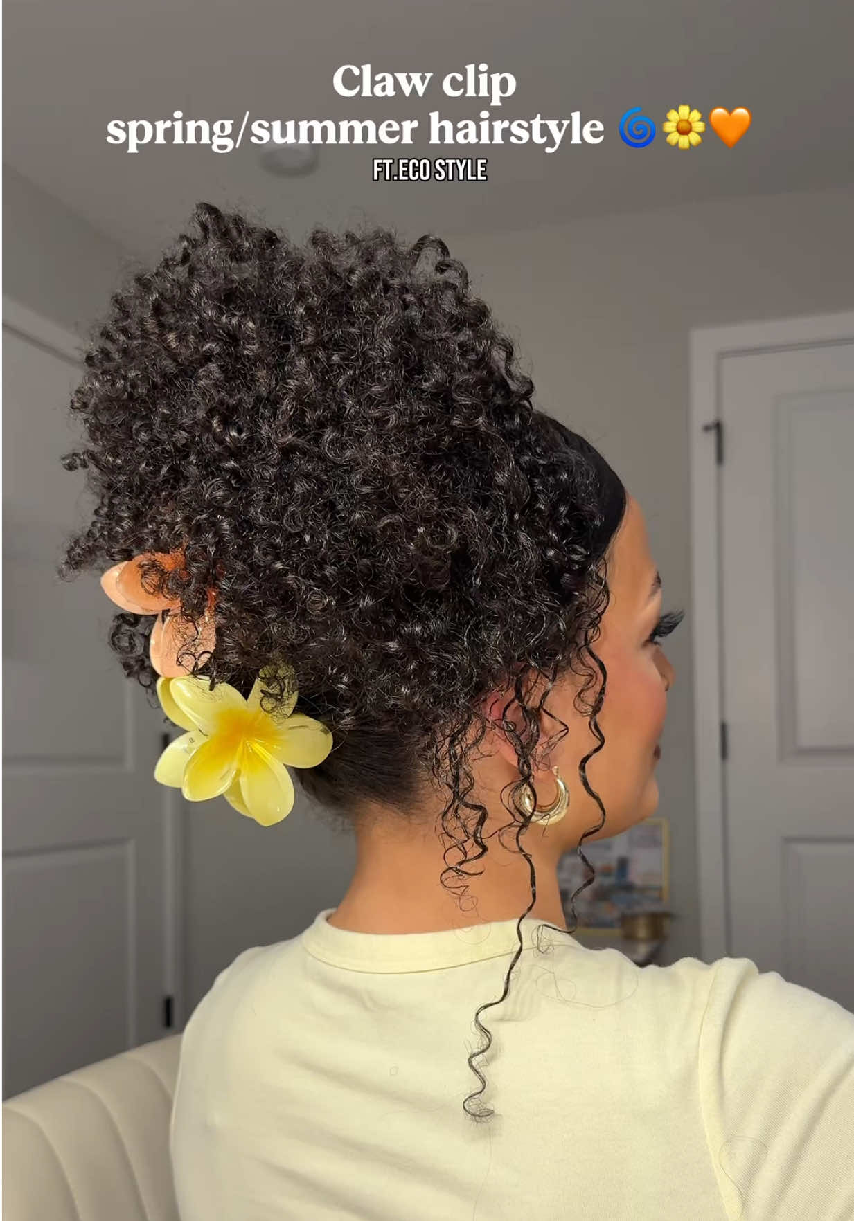 TikTok post by @_aubreanascurlss for ECO Style. Caption reads: Claw clip spring/summer hairstyle with @Eco Style....