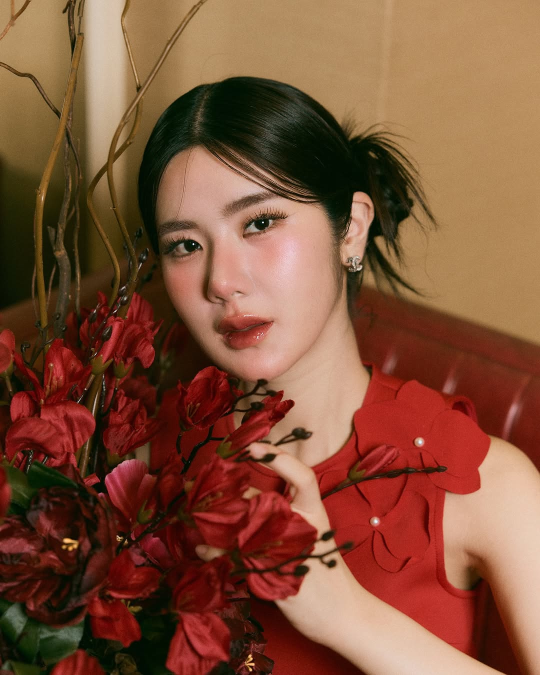 Instagram post by @noon_sutthipha for Pomelo Fashion. Caption reads: ❤️恭喜发财 #happychinesenewyear.