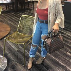 Instagram post by an influencer for ootdfash Boutique. Caption reads: Feed.