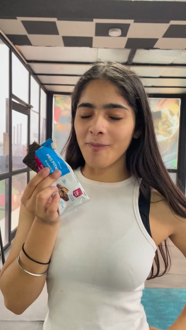 Instagram post by @mcspicynanya for MyFitness. Caption reads: [...] Protein Bar, by the makers of @myfitness....