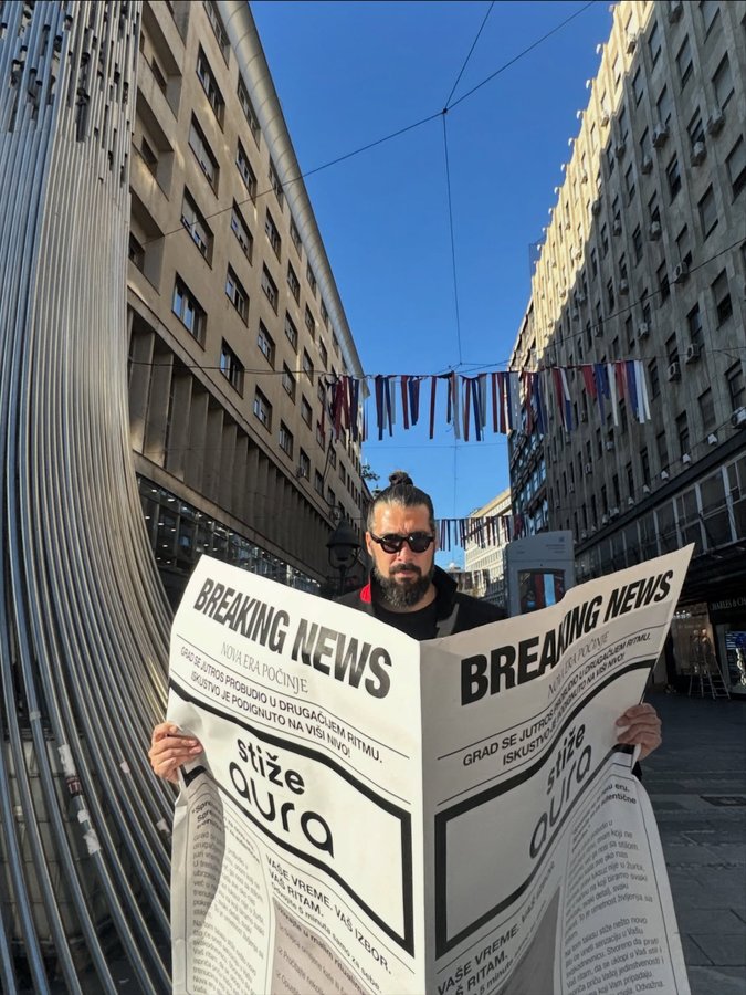 Instagram post by @nichimizazvan for Ploom. Caption reads: DOLAZI NAM NEŠTO NOVO…ZVUK GRADA, OSMEH I POZDRAV....