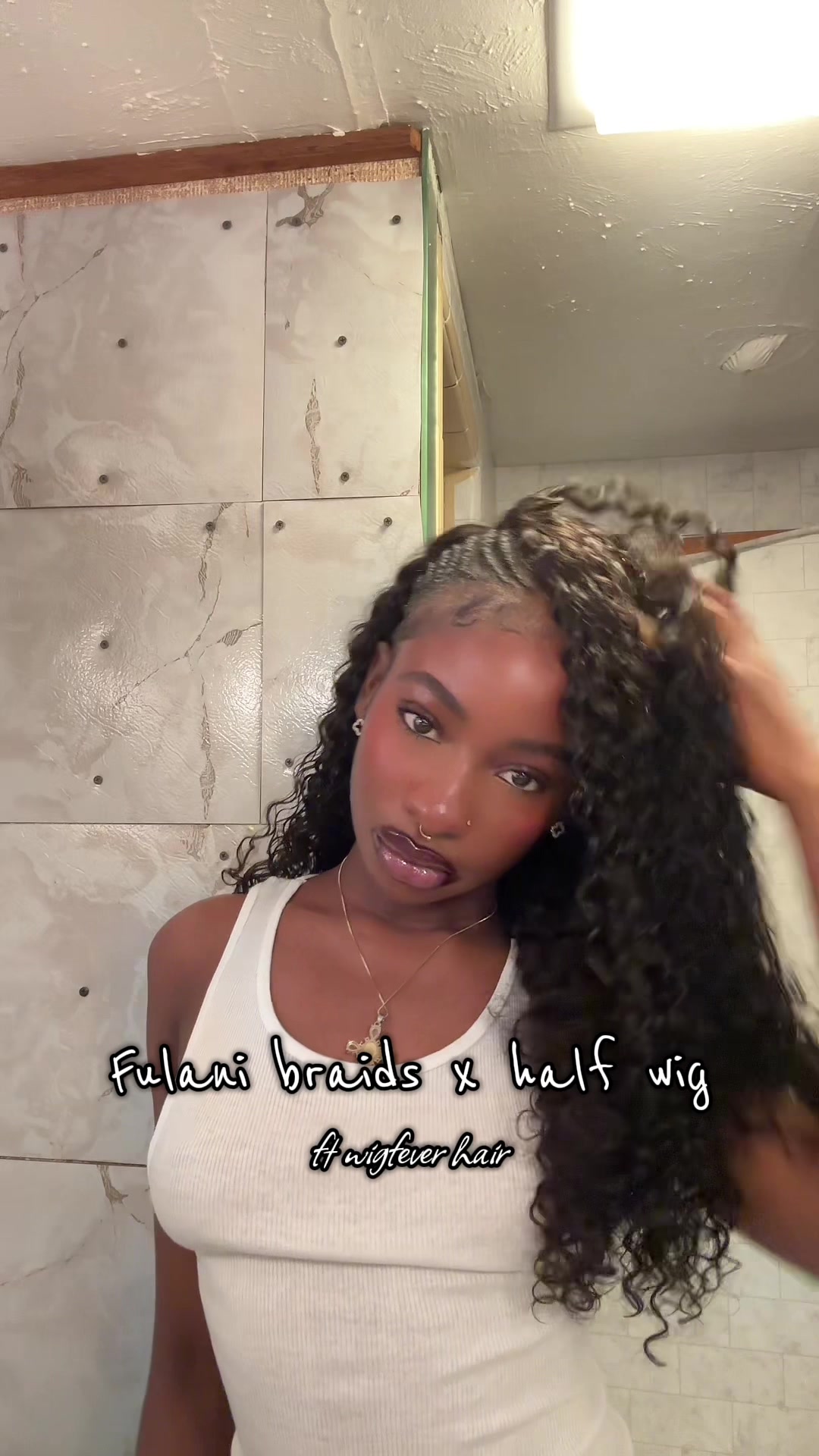 TikTok post by @sisidtm for WigFever. Caption reads: @WigFever Hair #fyp #wiginstall #fulanibraids....