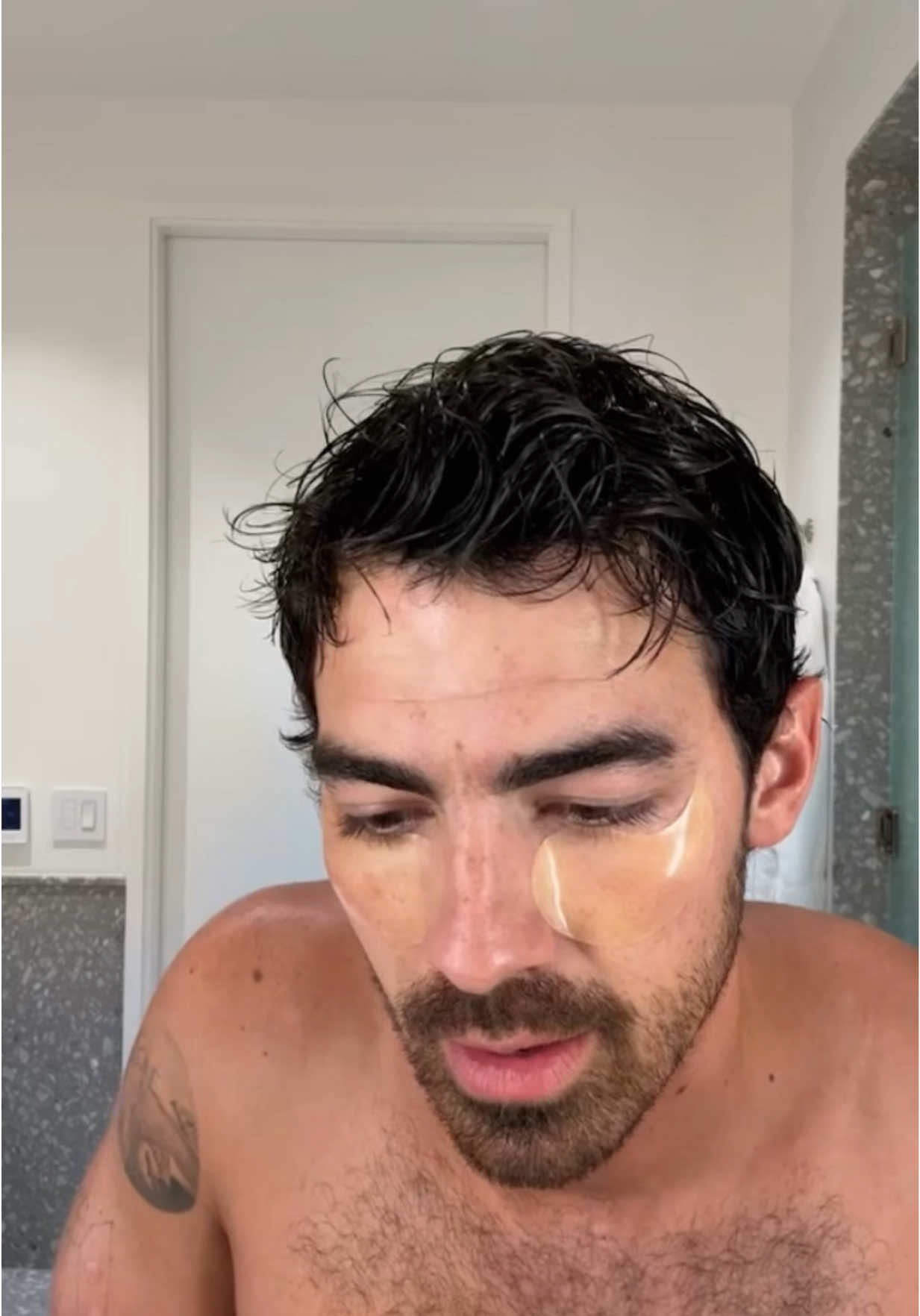 TikTok post by @joejonas for DERMA•E. Caption reads: Glowing skin doesn’t stop at that chin 😏 with....