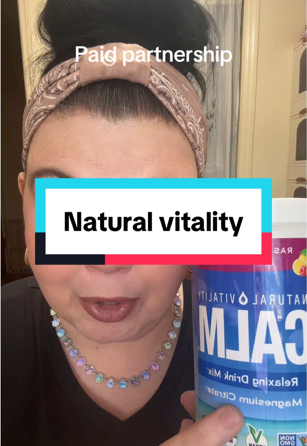 TikTok post by @tamberlynne24 for Natural Vitality. Caption reads: This is a paid partnership with @natural vitality....
