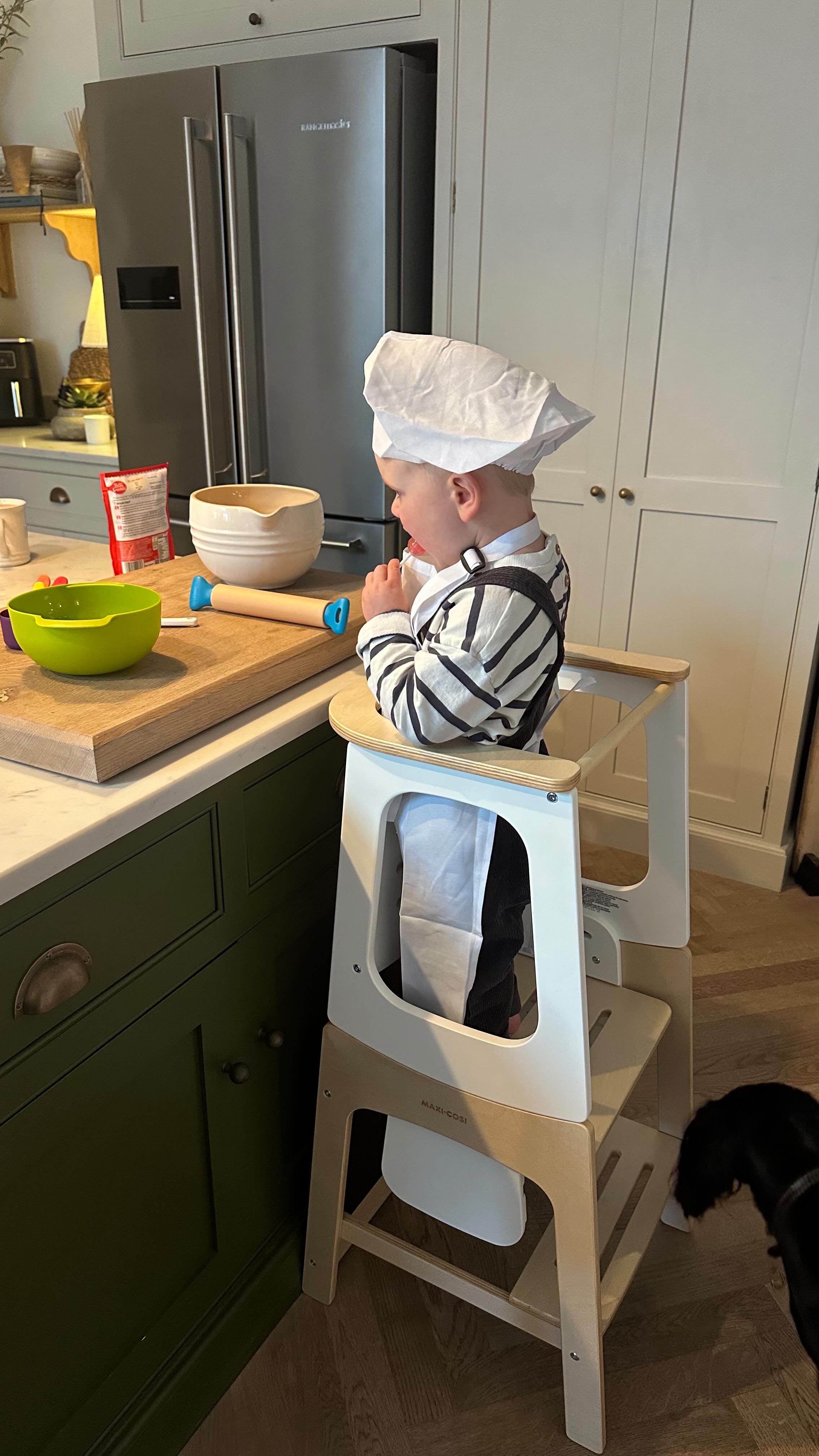 Instagram post by @amelia.home for Maxi-Cosi. Caption reads: A little mid-week baking with Archie ✨

This tower....