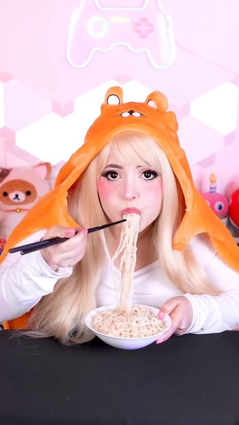 Instagram post by @letsplaykittyy for TokyoTreat. Caption reads: [...] trying the best Japanese snacks from....