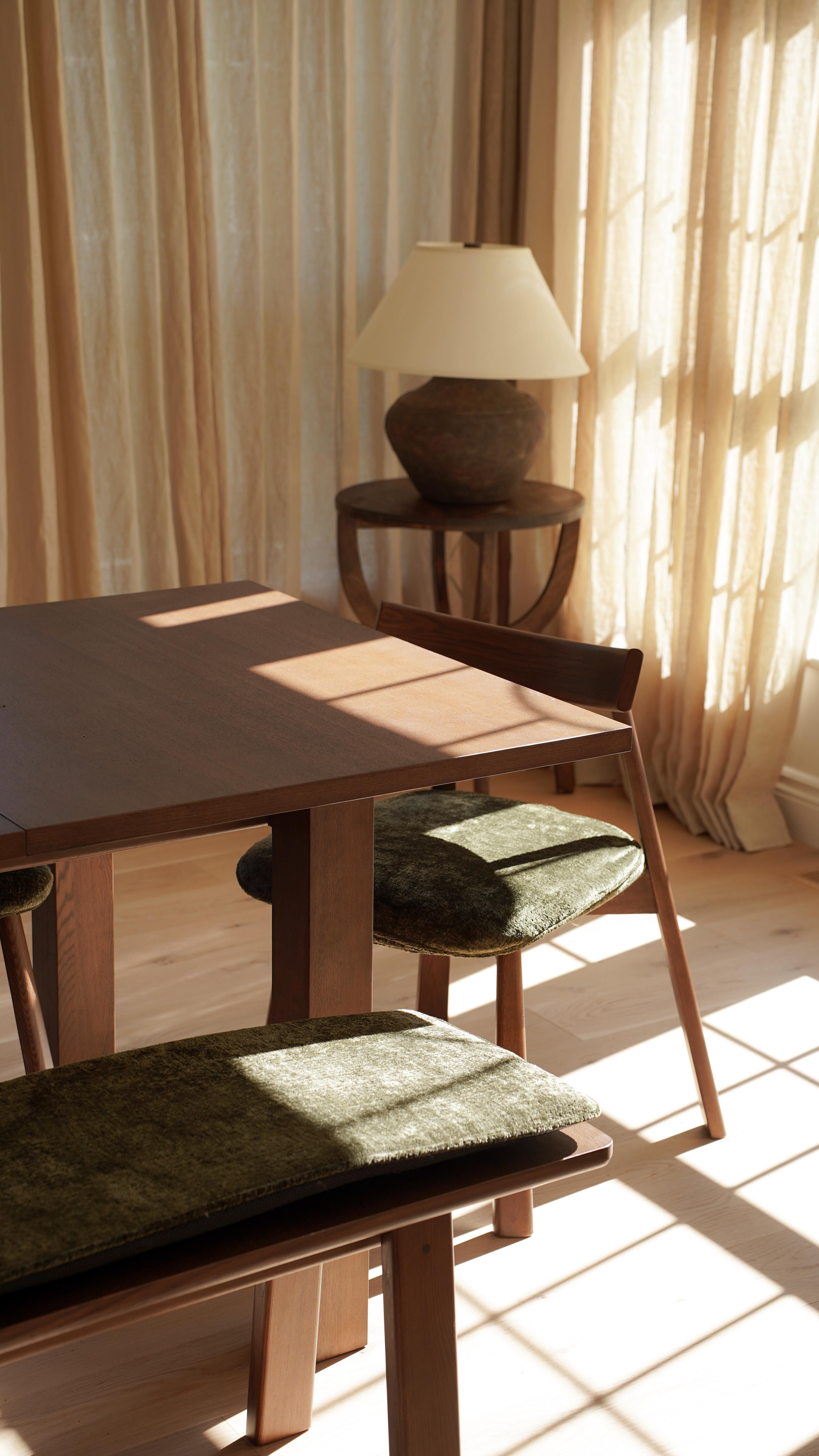 Instagram post by @jadewilson.f for Cozey. Caption reads: #AD A dining space that feels as thoughtful as it....