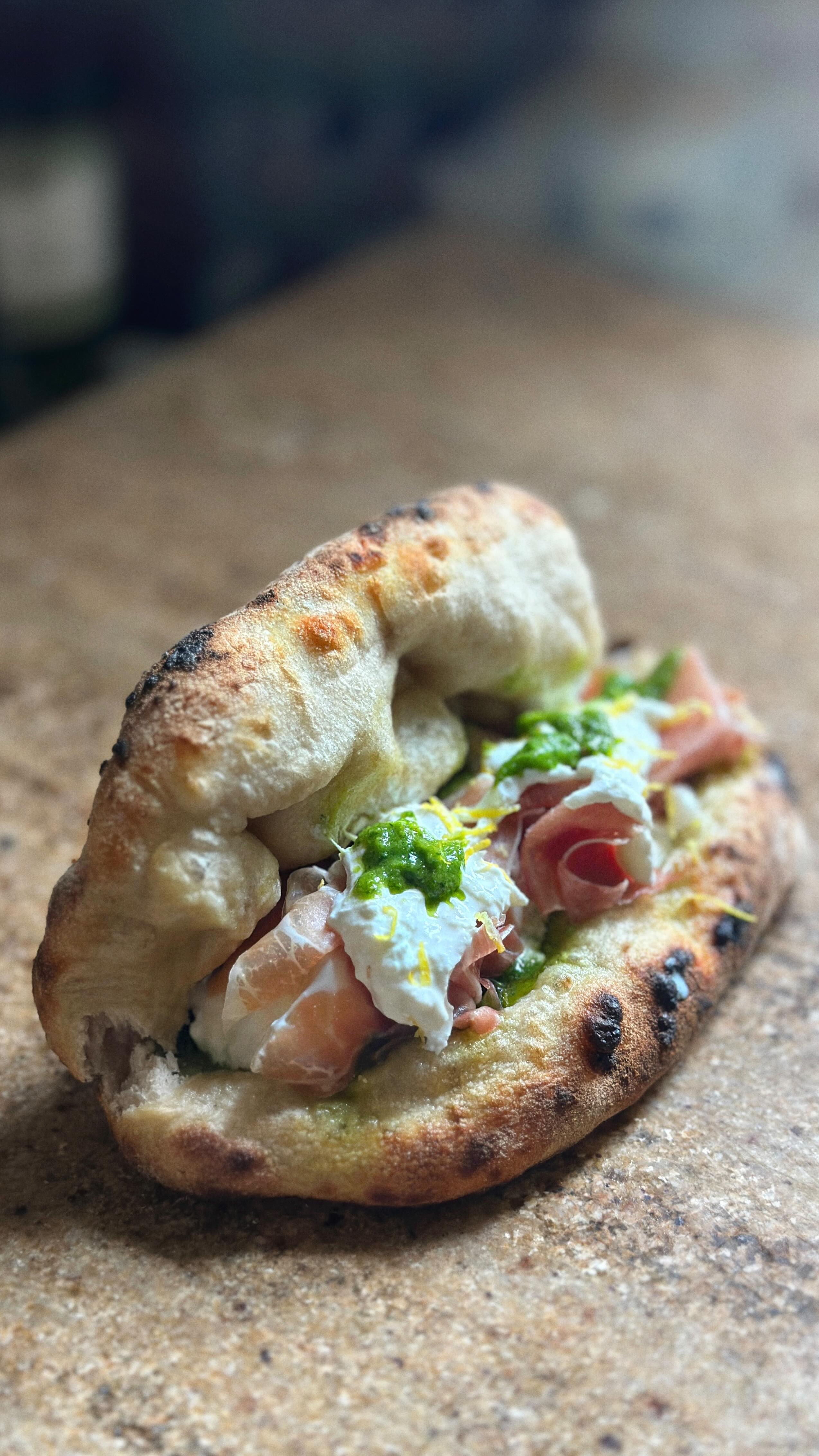 Instagram post by @dough_and_behold for Ooni. Caption reads: [...] sarnies these days using my Ooni Volt....