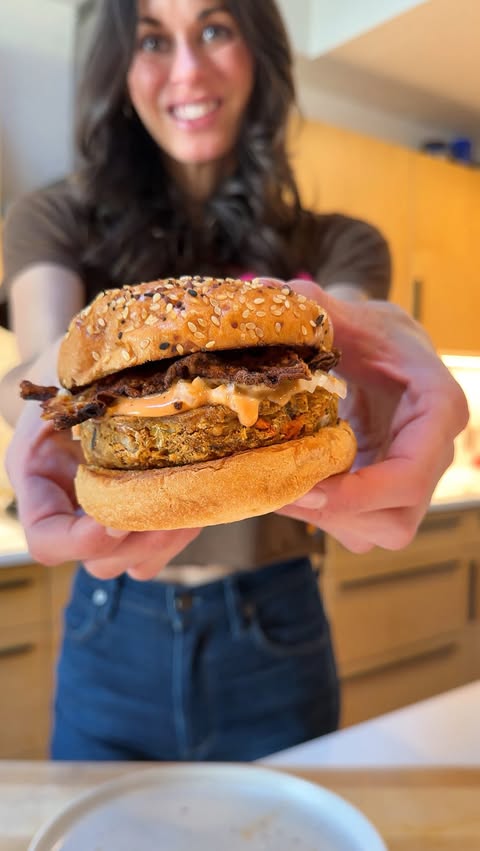 Instagram post by @jackfruitfulkitchen for Actual Veggies. Caption reads: HIGH PROTEIN LOADED BACON CHEESEBURGER (vegan)....