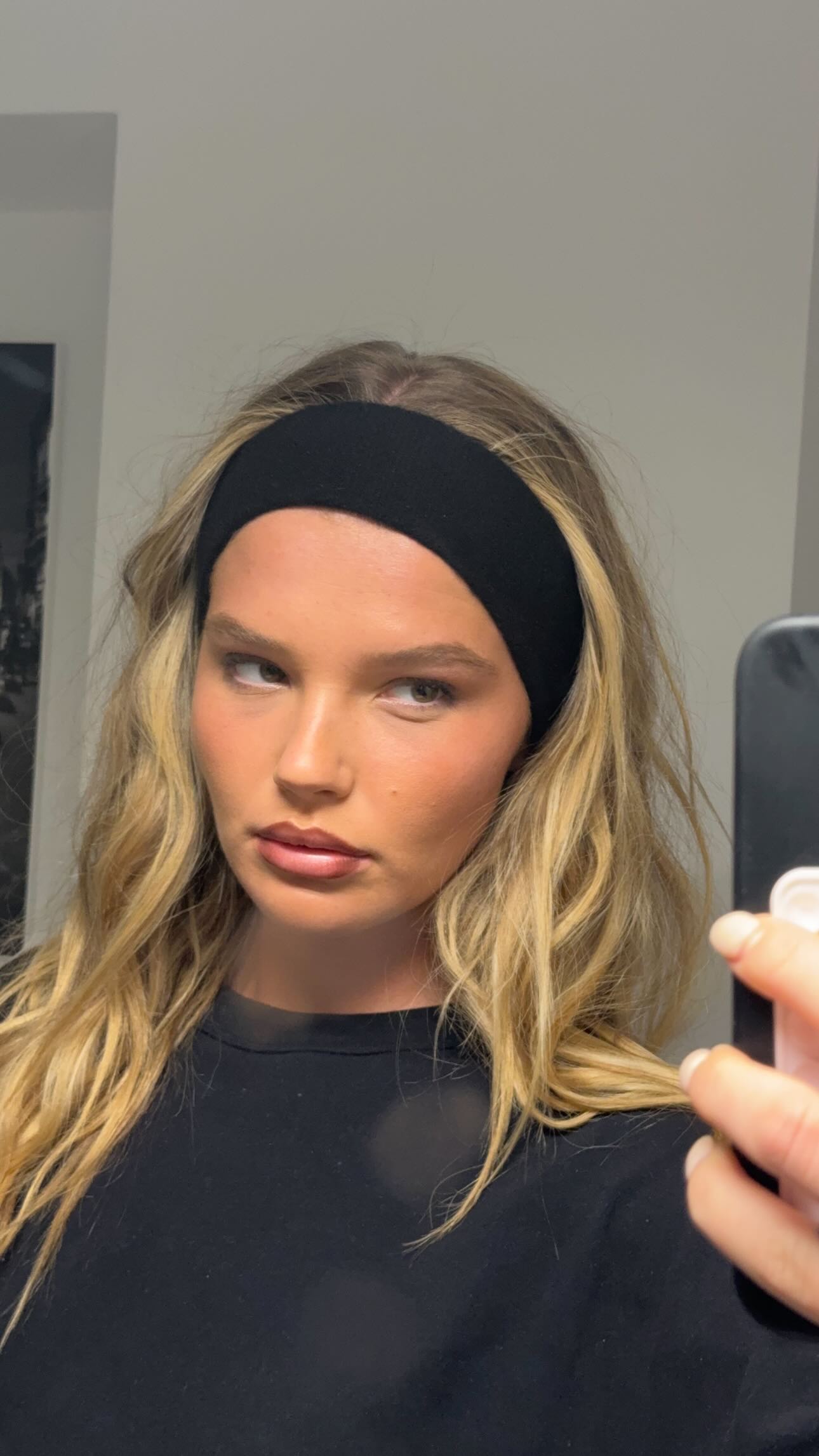 Instagram post by @elliethumann for Hero Cosmetics. Caption reads: Watch my skin transform in 7 days using the....