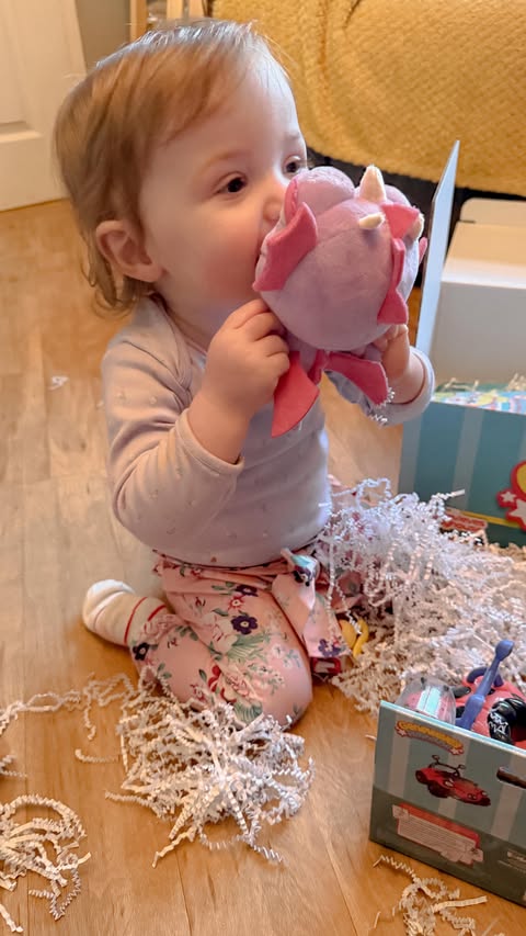 Instagram post by @the.essex.mum for Bonkers Toys. Caption reads: How cute is Callie kissing Coral the dragon....