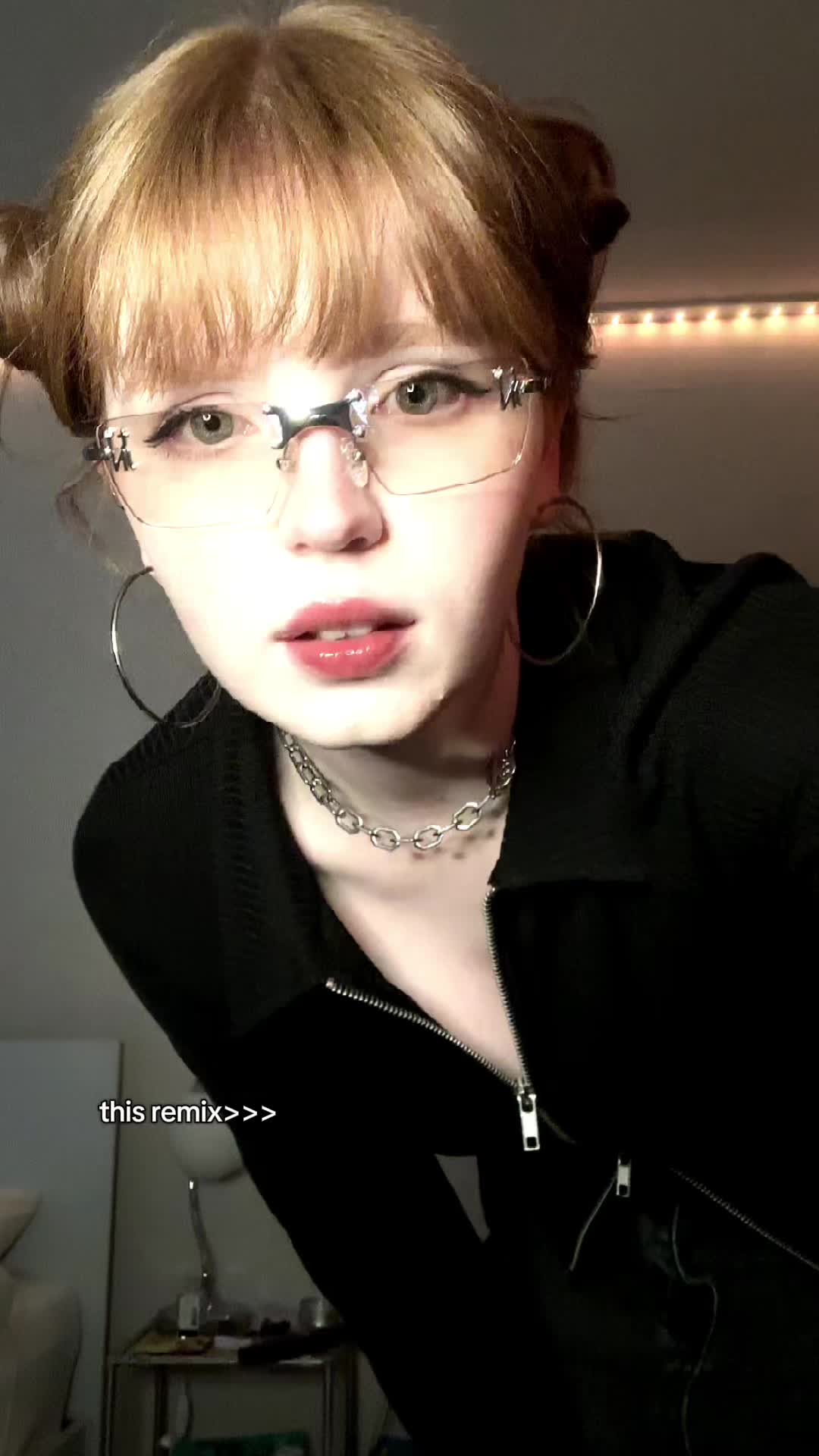 TikTok post by @monominjii for TIJN Eyewear. Caption reads: that one uneven part in my hair is driving me nuts....