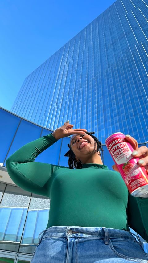 Instagram post by @loveronnie for Smirnoff. Caption reads: #ad We got away for a little staycation and....