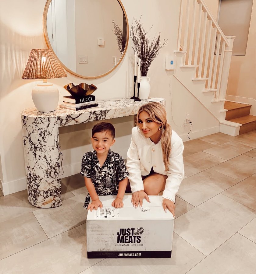 Instagram post by @myfashionontherox for Just Meats. Caption reads: Unboxing time! 🎉 Nixon and I just got our box....