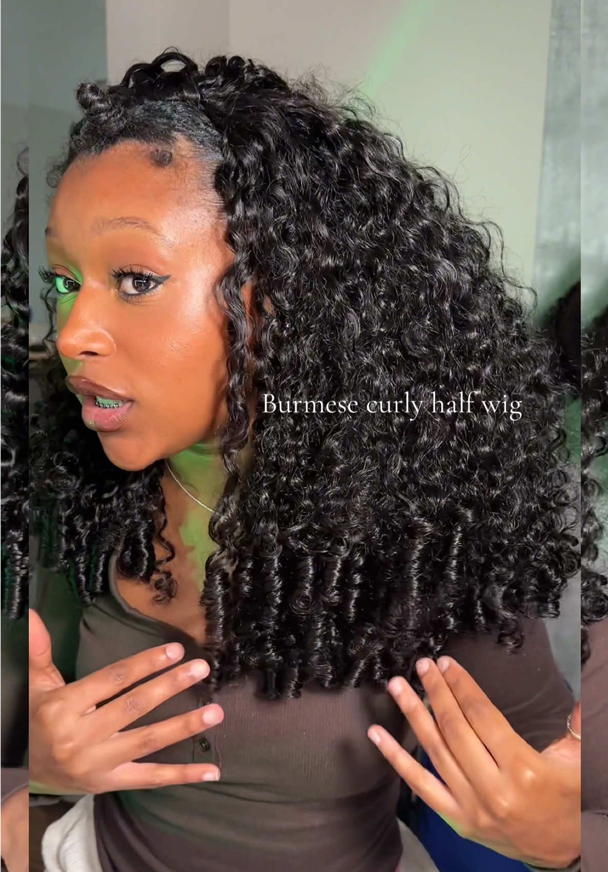 TikTok post by @zakaiyahhh for iseehair. Caption reads: @ISEEHAIR 24” Burmese curly half wig 🍒....