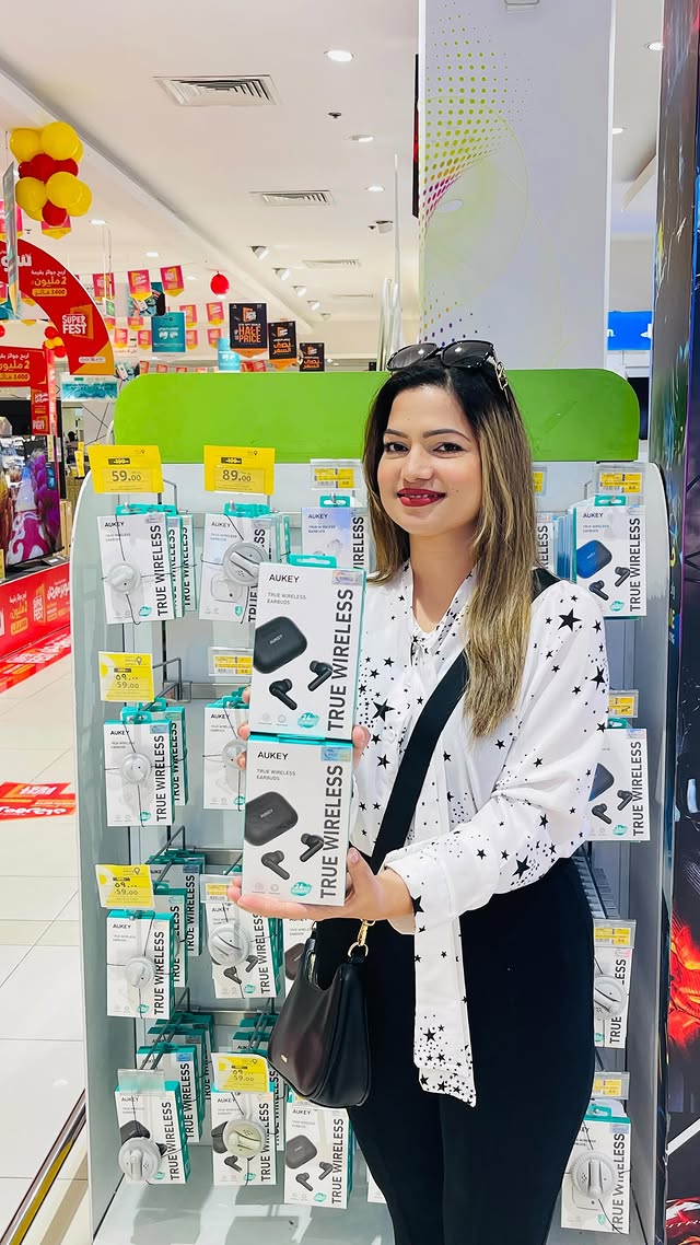 Instagram post by @shifafirdausofficial for Aukey. Caption reads: @aukey.saudi Aukey power bank has a capacity of....