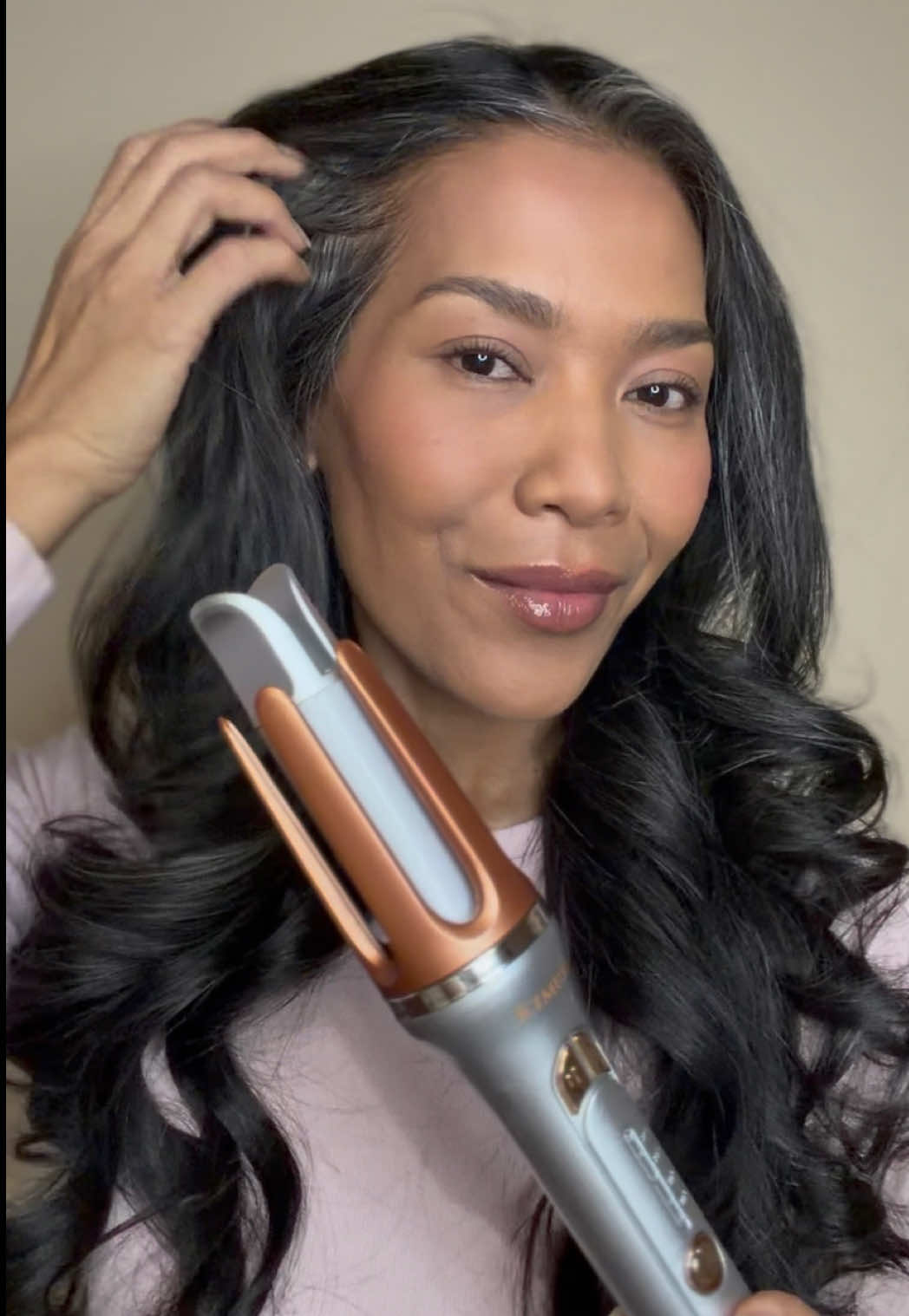 TikTok post by @zinniebloom for Kimuse. Caption reads: #ad One-touch curls made easy. The Kimuse....
