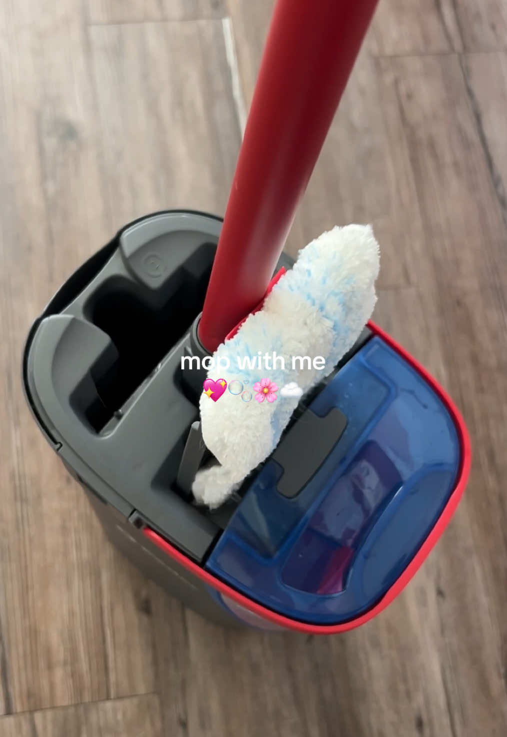 TikTok post by @brittany_qz for O-Cedar. Caption reads: love using the ocedar flat mop on my vinyl floors.....