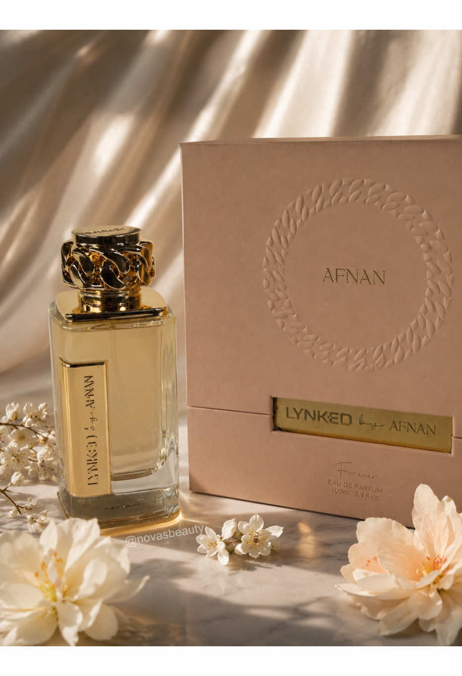 TikTok post by @novasbeauty16 for Afnan Perfumes. Caption reads: [...] de Descuento: NOVASBEAUTY @Afnan Perfumes....
