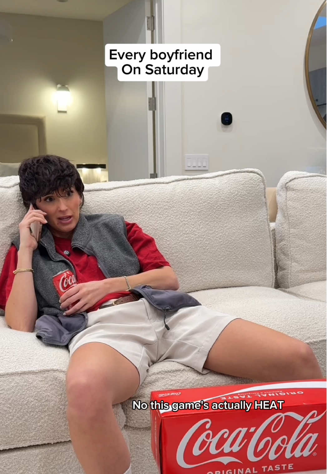 TikTok post by @corporatenatalie for Coca-Cola. Caption reads: #ad Guys he’s really busy! Chief Fan Officer for....