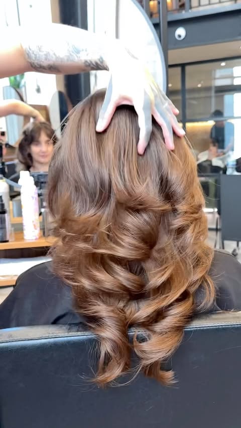 Instagram post by @lulurichardss for BaBylissPRO. Caption reads: layerzzzzz 💫💫💫 using @babylisspro air wand....