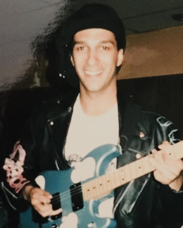 Instagram post by @tommorello for Fender. Caption reads: Earliest photo of the “ARM THE HOMELESS” guitar! I....
