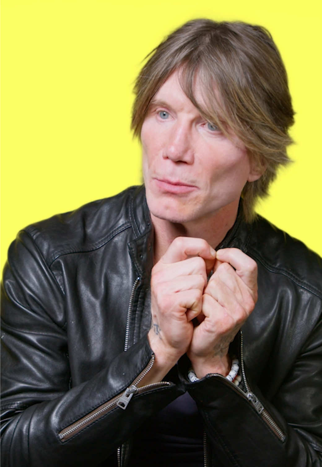 TikTok post by @googoodollsofficial for Genius. Caption reads: Writing "Iris" was like catching lightning in a....