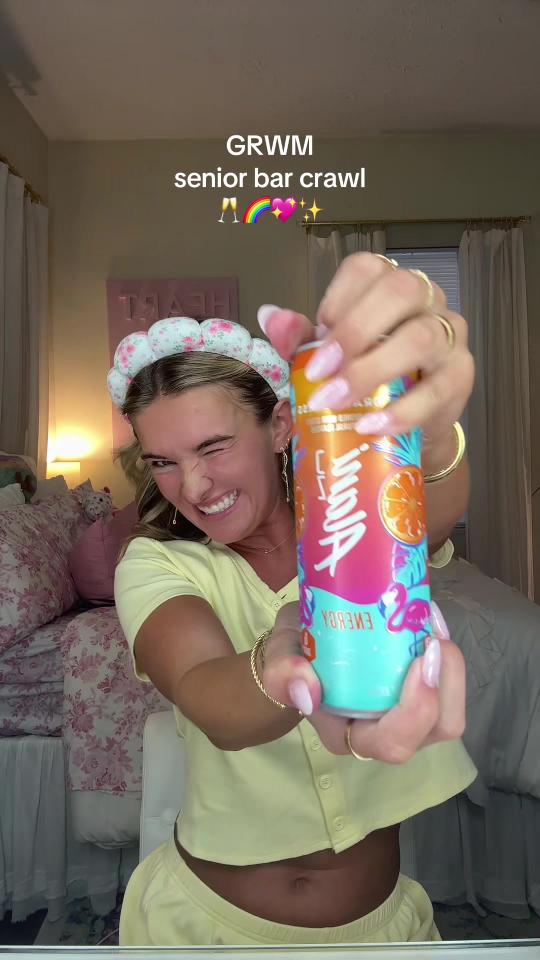 TikTok post by @laniekristin for Alani Nu. Caption reads: GRWM for my senior bar crawl!!!🥂🌈💖✨ @Alani Nu....