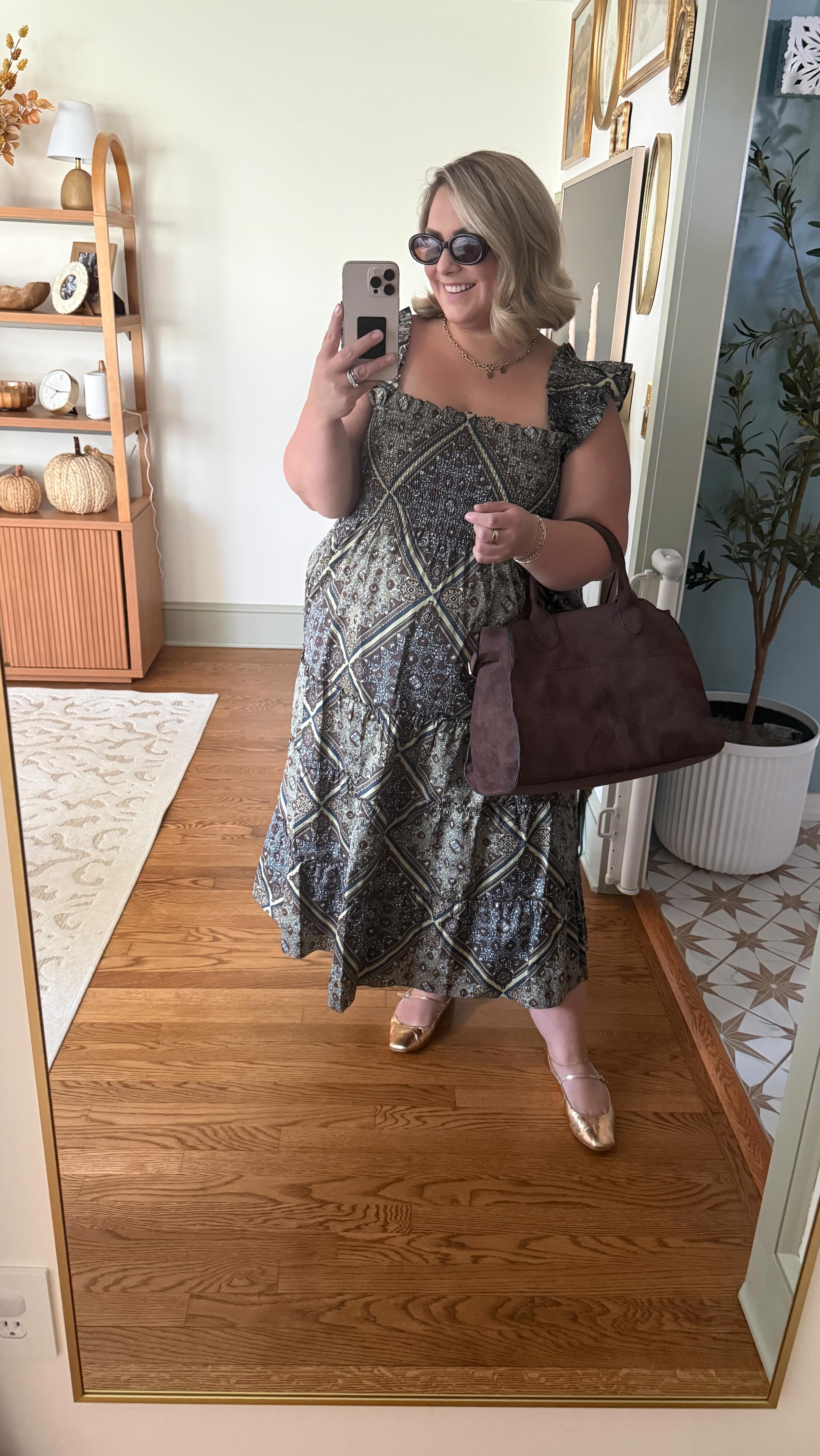 Instagram post by @everythingemilyann for Hill House Home. Caption reads: The perfect fall dress? She’s right here 😍....