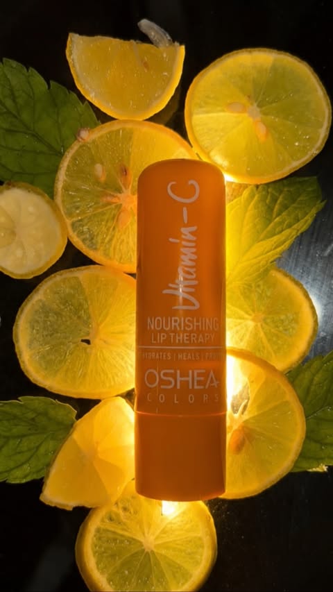 Instagram post by @aura.__.aesthetics for Oshea Herbals. Caption reads: [...] & SPF-protected lips all day. 💛✨....