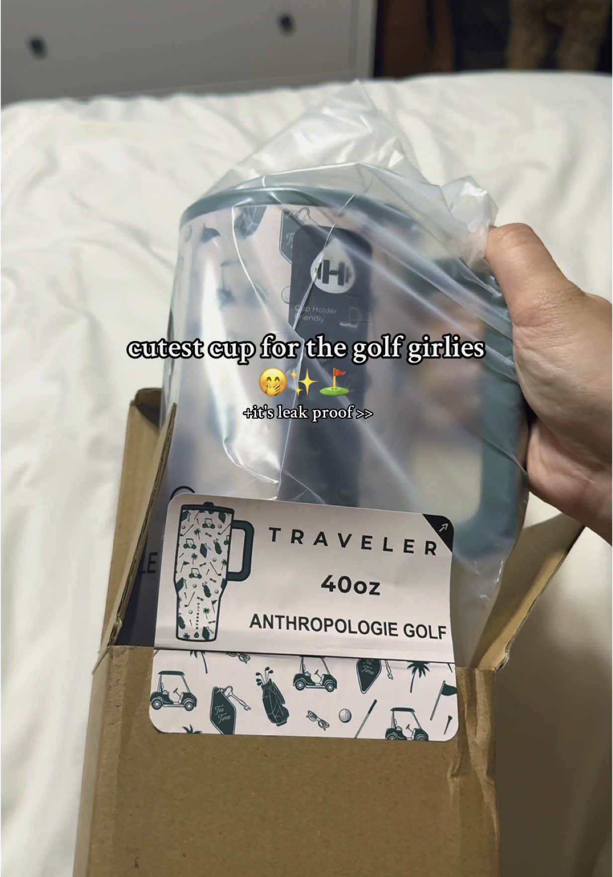 TikTok post by @madi.lynn.b for Anthropologie. Caption reads: obsessed with the print ⛳️ #hydrojug....