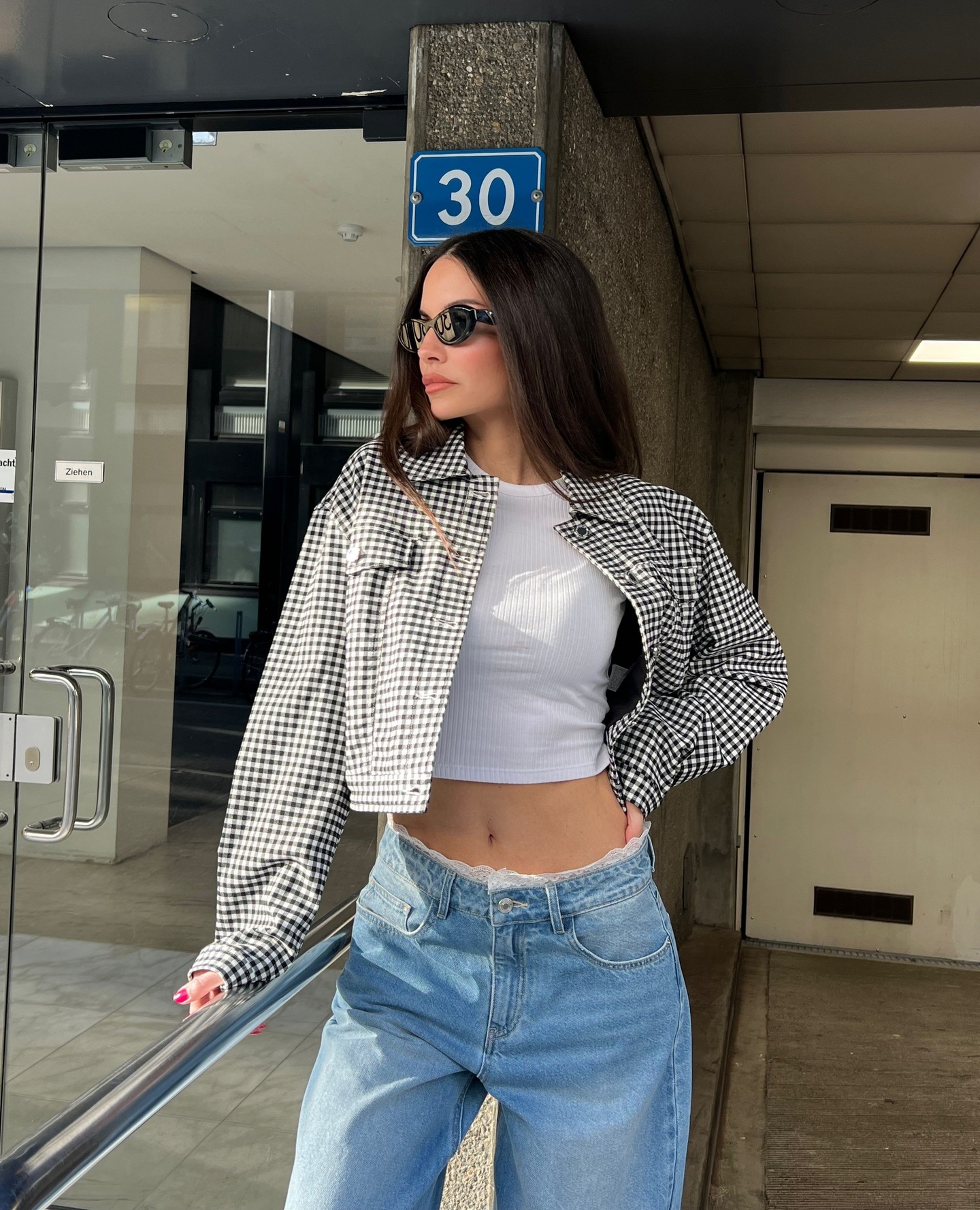 Instagram post by @nadinevinzensofficial for Tally Weijl. Caption reads: Effortlessly cool, unapologetically me.....