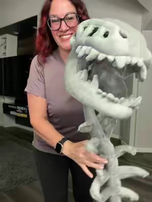 TikTok post by @onetiredmama9 for Joyfy-US. Caption reads: #dinosaurcostume #halloweencostume #joyin @JOYIN.