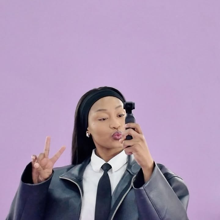 Instagram post by @oratiletlhapi for Dark and Lovely. Caption reads: Enrolled at Beauty University for the day with....