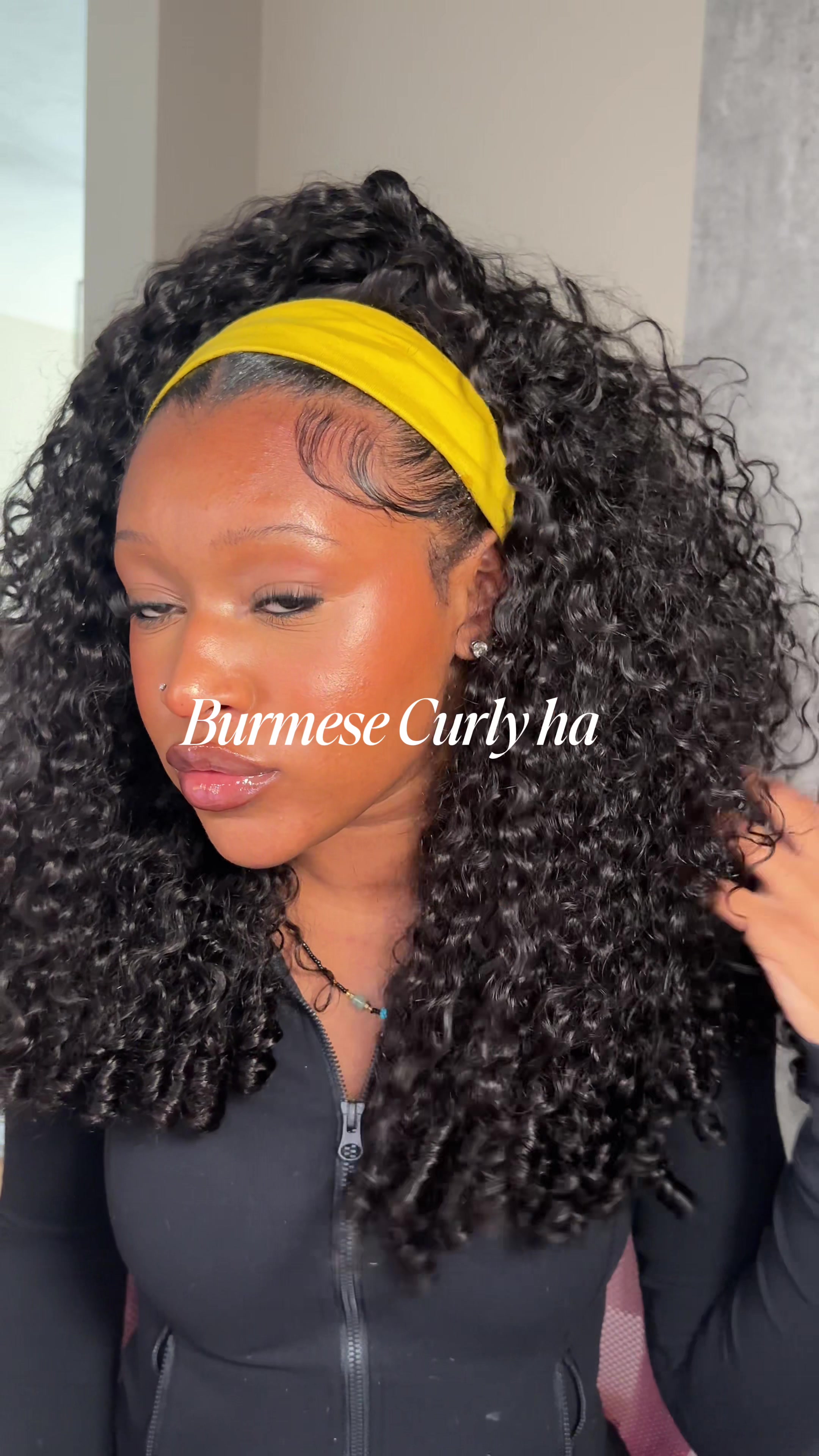 TikTok post by @zakaiyahhh for OQHAIR. Caption reads: @OQHAIR ❄️ Burmese curly half wig 24 inches....