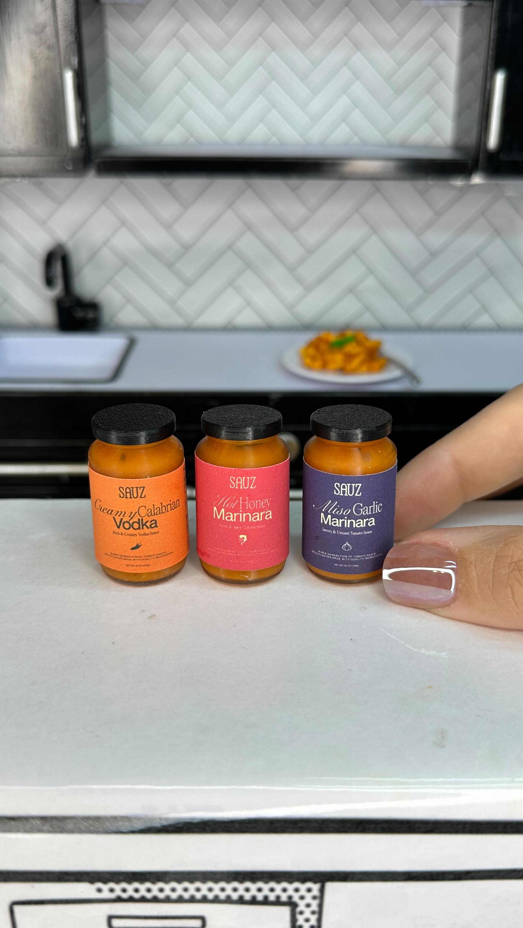 Instagram post by @making_itmini for SAUZ. Caption reads: [...] flavor 🙌 Featuring the delicious @getsauz....