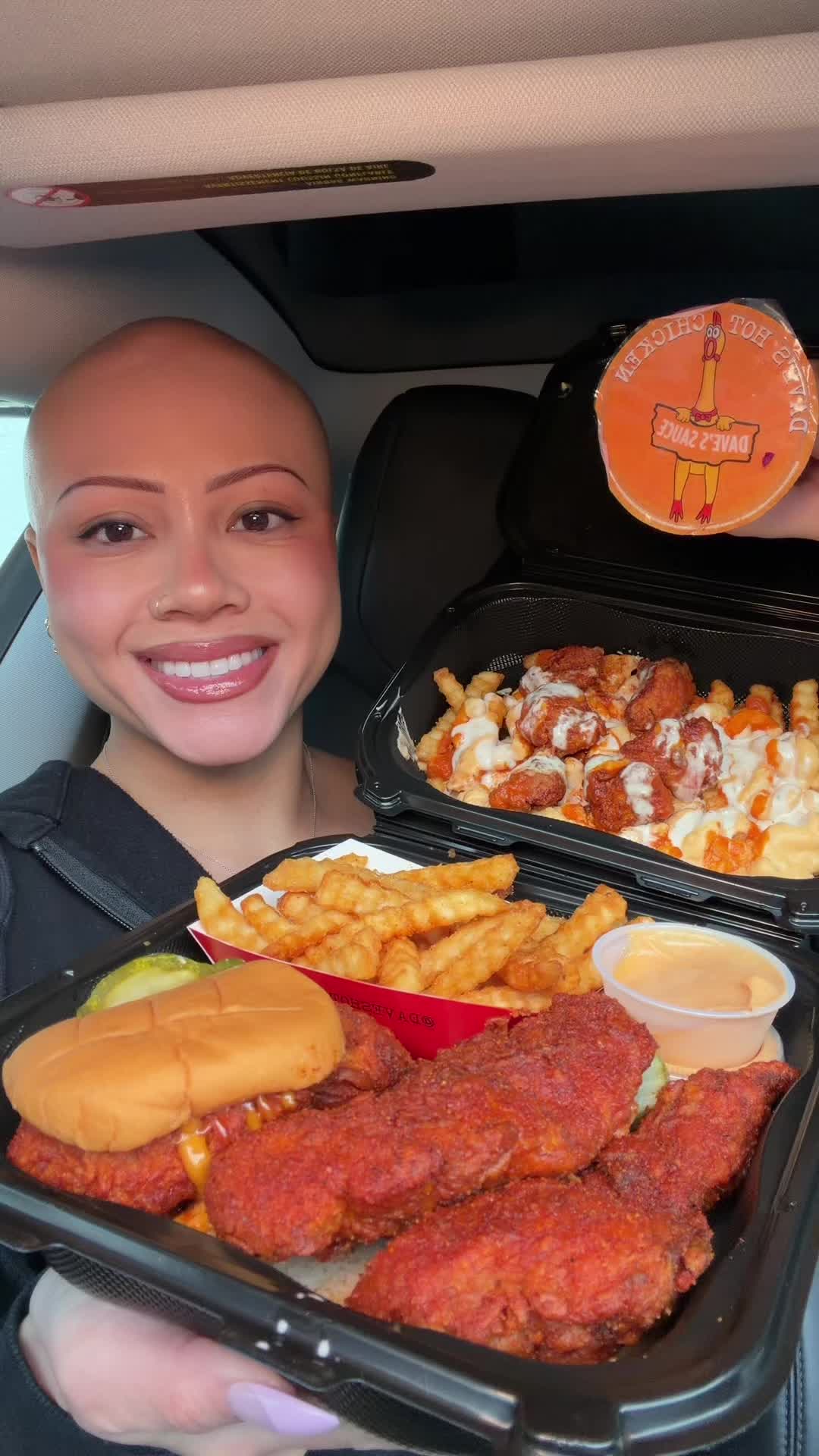 TikTok post by @janemukbangs for Bloom Nutrition. Caption reads: [...] in the car 🍗😍 They never miss!! @Bloom....