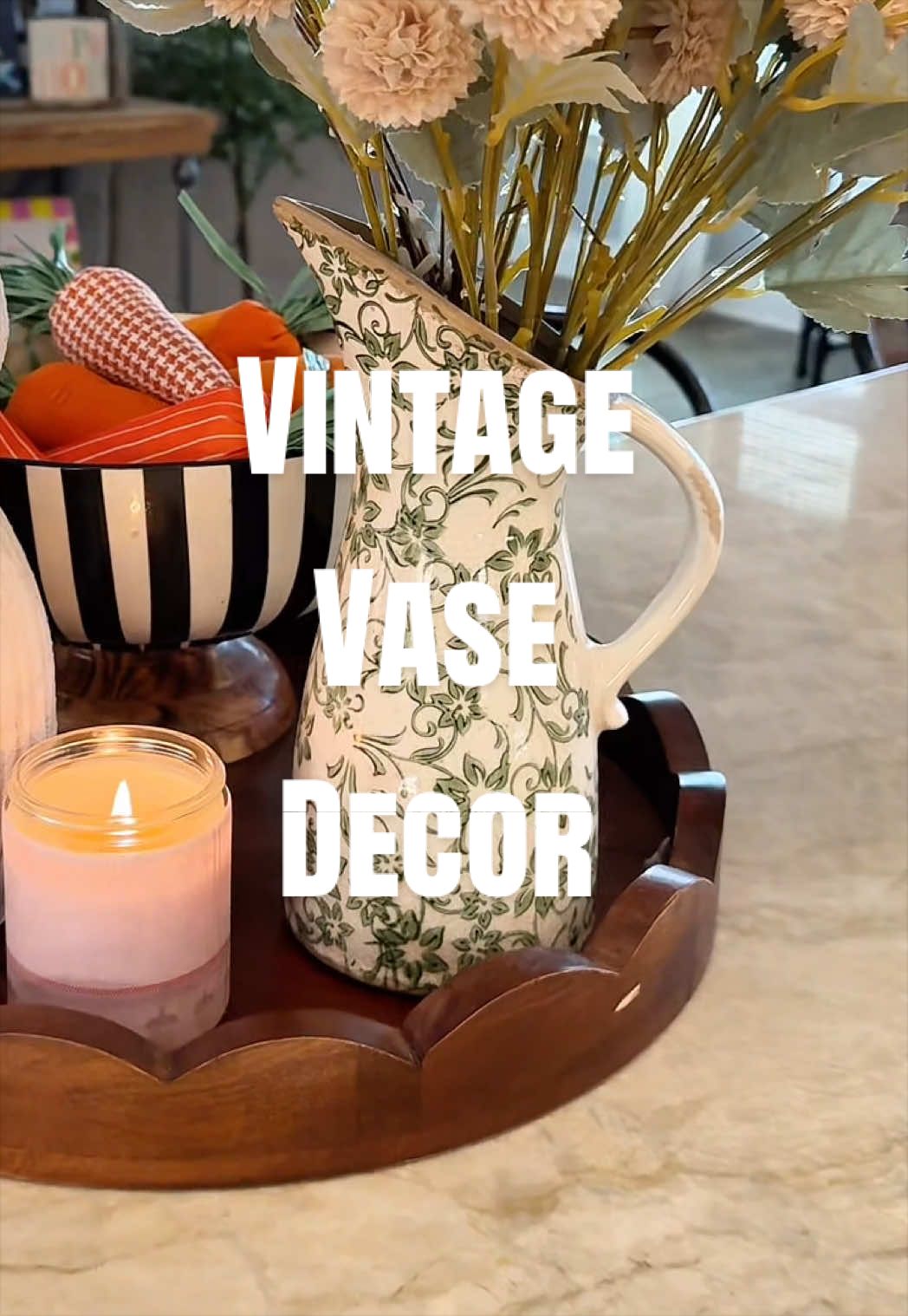 TikTok post by an influencer for QVC. Caption reads: [...] to @Aubs vintage vase decor @QVC, Inc.