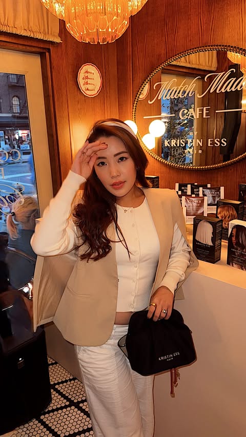 Instagram post by @explorewithdasom for Kristin Ess Hair. Caption reads: [...] for more nyc popup finds! @kristinesshair....