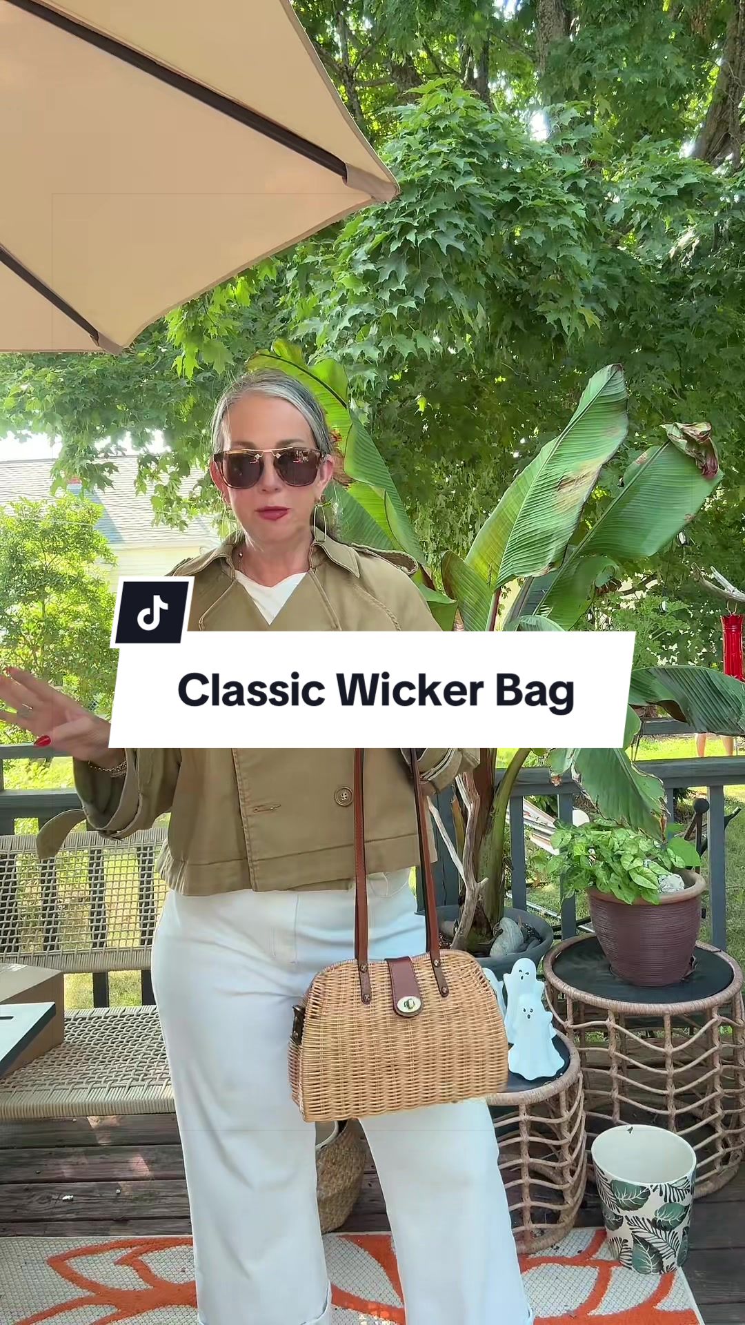TikTok post by @aestheticaleestyles for QVC. Caption reads: [...] classic style wicker bag from @QVC, Inc....