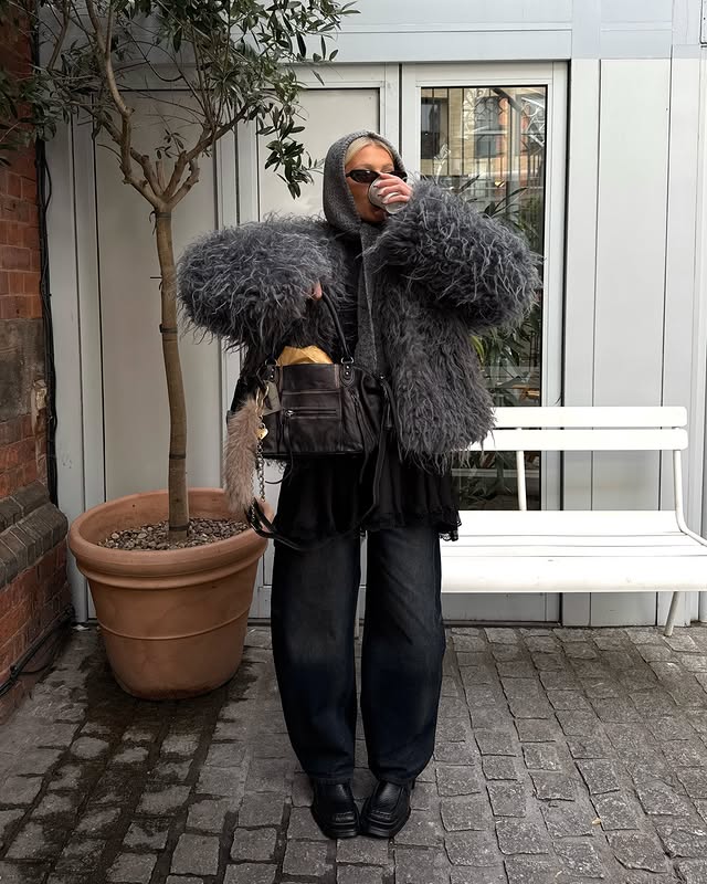 Instagram post by @_rebeccajackson for Free People. Caption reads: In and around the city 🏙️ wearing @freepeopleeu....